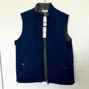 Tommy Bahama Reversible Vest - Large
Brand New with tags
Blue / Heather Grey